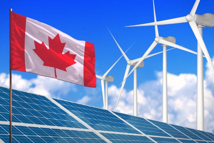 Solar panels and wind turbines in Canadian landscape